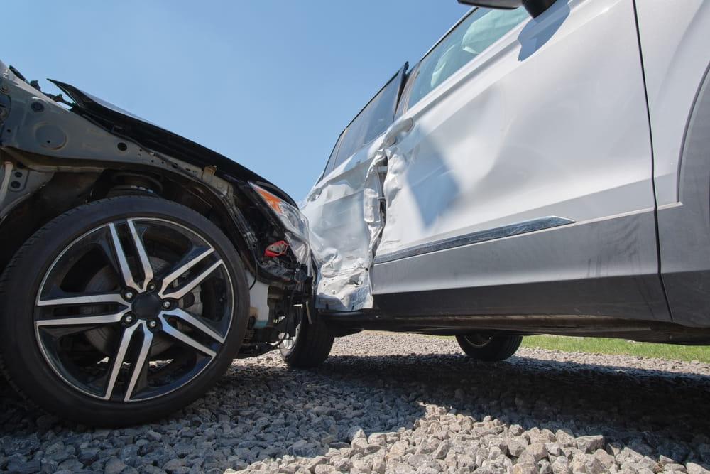 Vehicle damage from a car accident on a Dallas roadway